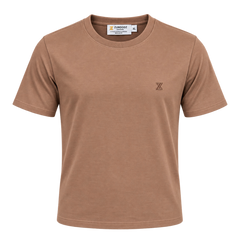 A short-sleeve crewneck t-shirt in a warm tan or camel brown color, featuring a small dark embroidered 'Z' logo on the left chest. The brand name 'ZUNDOOZ' is visible on the inner neck label.