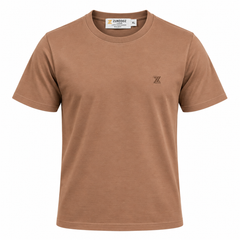 A short-sleeve crewneck t-shirt in a warm tan or camel brown color, featuring a small dark embroidered 'Z' logo on the left chest. The shirt is displayed flat against a solid white background, with a visible brand label inside the collar reading 'ZUNDOOZ'.