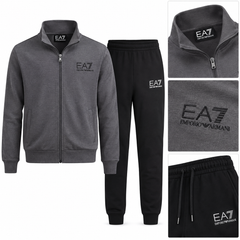 A two-piece athletic tracksuit set by Emporio Armani / EA7, featuring a heather gray zip-up jacket and black jogger pants, both with EA7 branding. The image includes a main product layout and three detail inset images showing the collar, fabric texture, and logo on the pants.