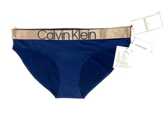 Blue Calvin Klein underwear with gold waistband on a white background