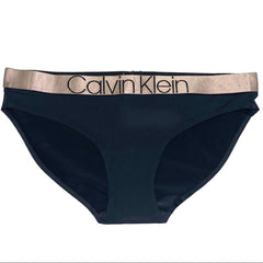 Black Calvin Klein underwear with gold waistband on a white background