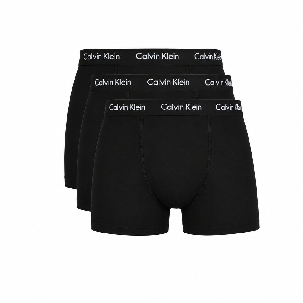 Three pairs of black Calvin Klein boxer briefs arranged in a fan shape against a white background.