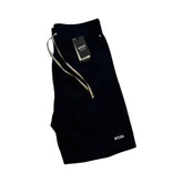 A pair of navy-colored Boss Unique men's home wear shorts with a drawstring waistband, displayed against a white background.