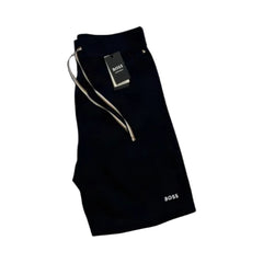 A pair of navy-colored Boss Unique men's home wear shorts with a drawstring waistband, displayed against a white background.