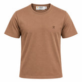 A short-sleeve crewneck t-shirt in a warm tan or camel brown color, featuring a small dark embroidered 'Z' logo on the left chest. The shirt is displayed flat against a solid white background, with a visible brand label inside the collar reading 'ZUNDOOZ'.
