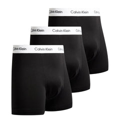 Three pairs of black Calvin Klein boxer briefs arranged in a staggered stack, showing the white branded waistbands against a light gray background.