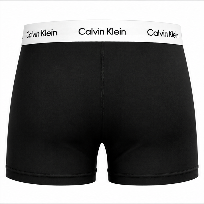 Three views of black Calvin Klein men's boxer briefs on a white background, with the brand name visible on the waistband.
