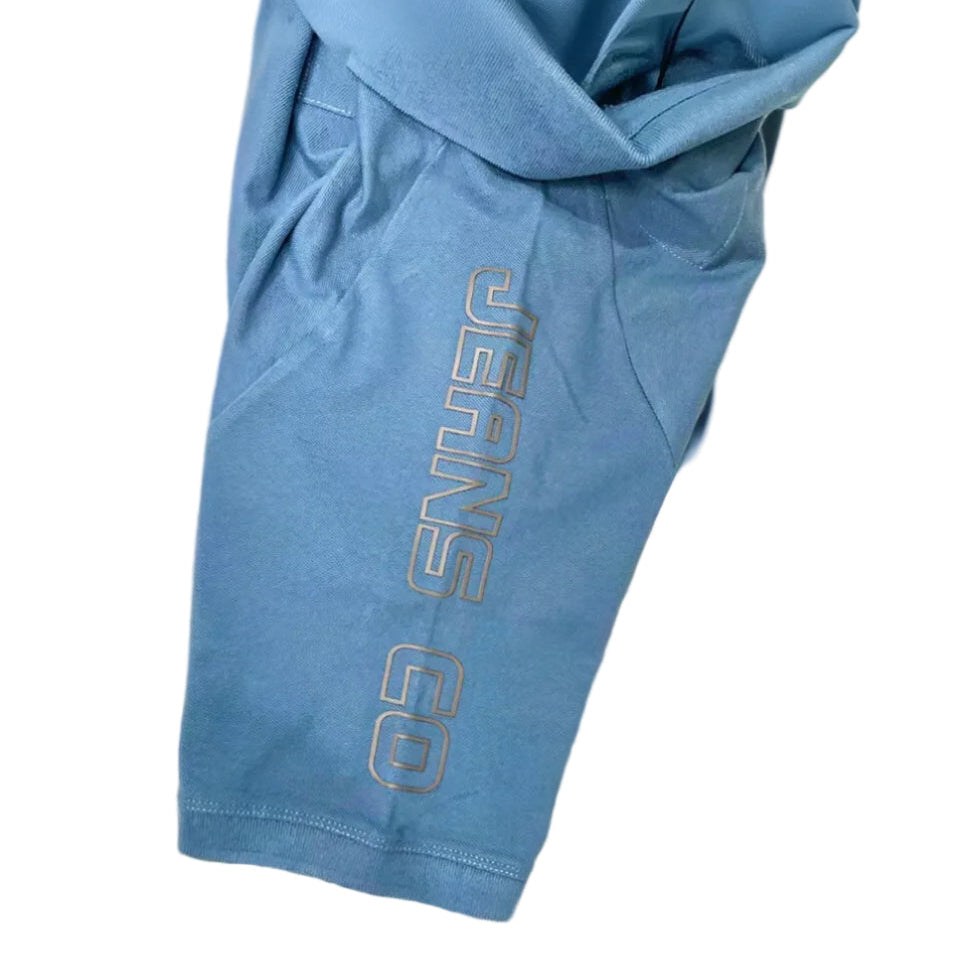 Blue shorts with a brand logo on a white background