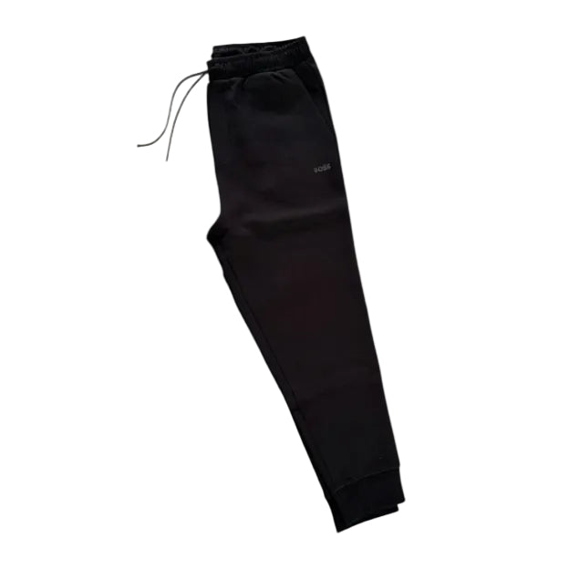 Black jogger sweatpants with an elastic drawstring waist and ribbed ankle cuffs, shown against a plain white background.