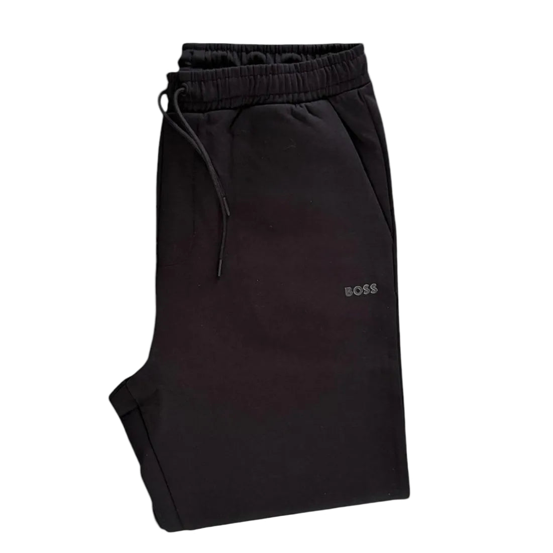 Black BOSS jogger sweatpants with an elastic waistband, black drawstring, and a small silver BOSS logo on the left thigh, shown against a plain white background.