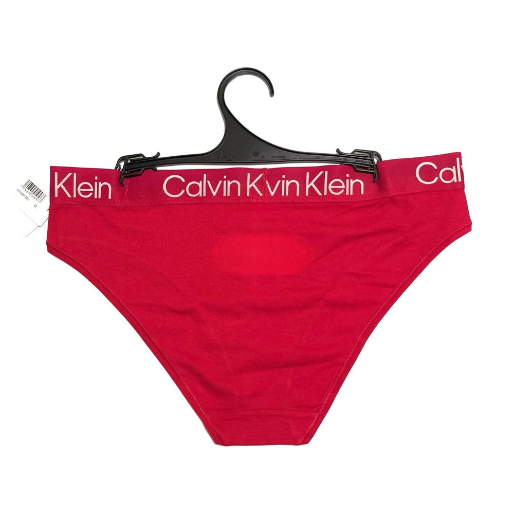 Red Calvin Klein underwear on a hanger with visible branding.