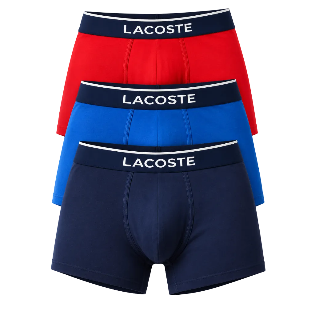 Three pairs of Lacoste men's boxer briefs stacked vertically, showing the red, blue, and navy blue options. Each pair features a dark navy elastic waistband with the brand name 'LACOSTE' printed in white capital letters.
