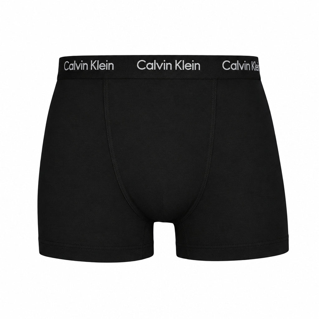Calvin Klein black boxer briefs with a white branded waistband, shown on a clean white background with a soft shadow underneath.