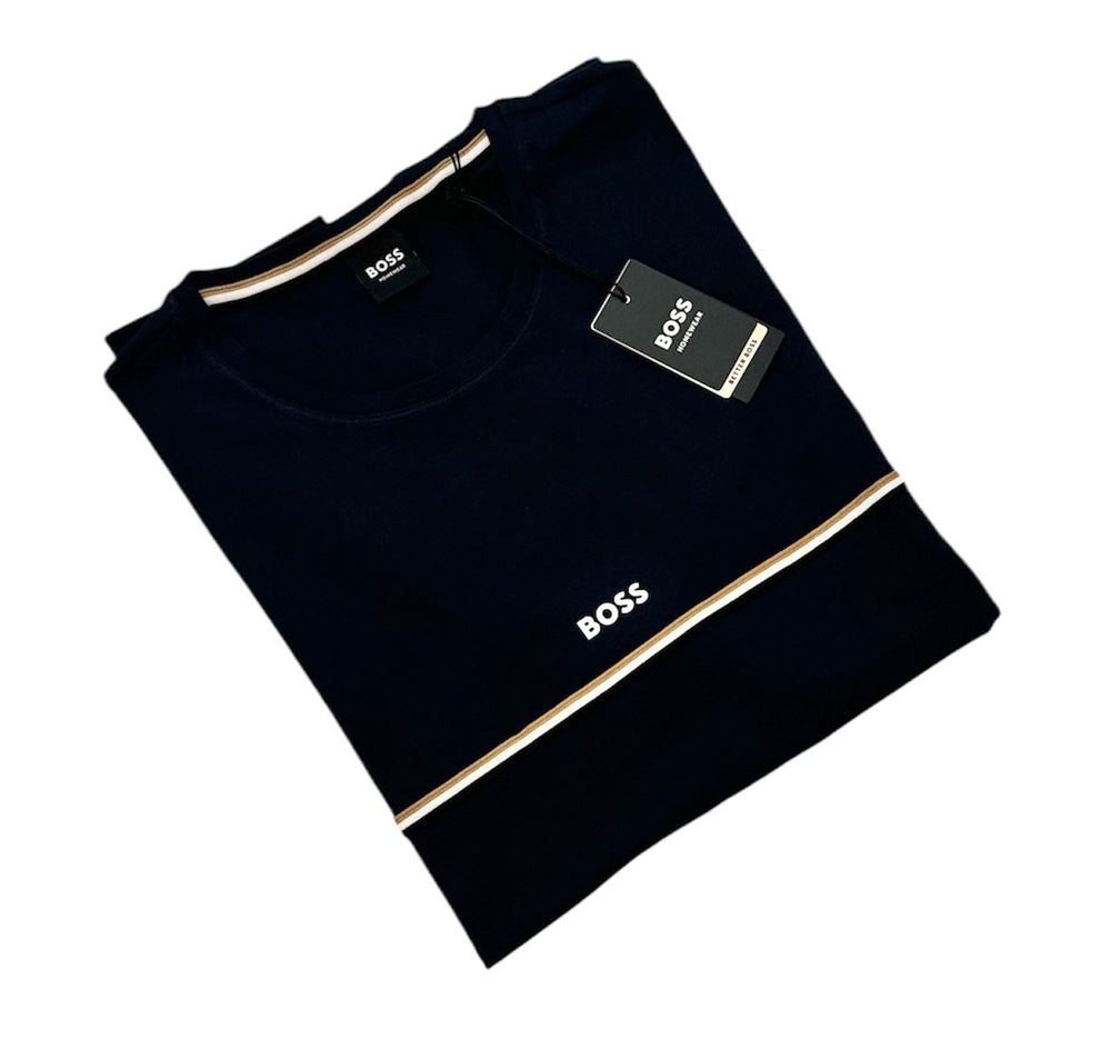 A navy-colored Boss crew neck t-shirt with short sleeves and the brand's logo visible on the chest area, presented in a folded state with a tag attached.