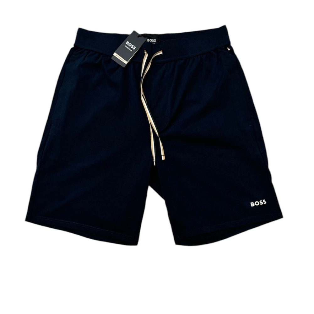 Navy blue BOSS athletic shorts with a beige drawstring and a white BOSS logo on the lower left leg, shown on a plain white background with a retail tag attached.