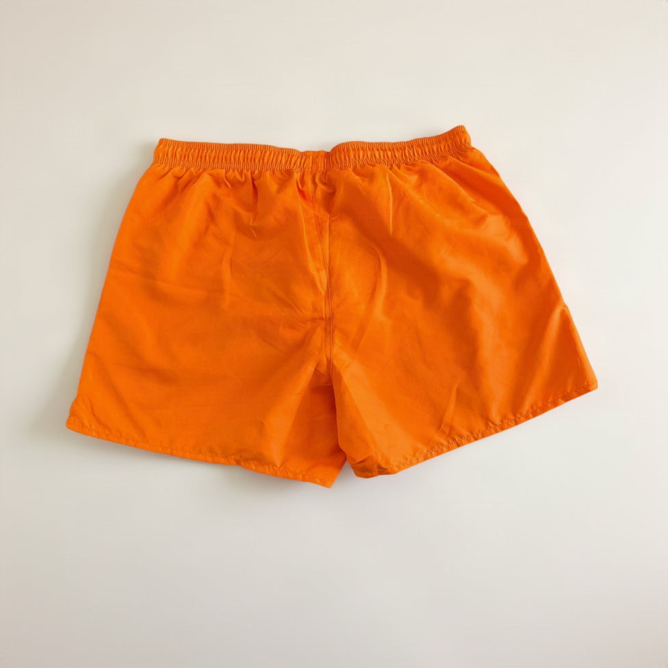 Bright orange athletic shorts with an elastic waistband, shown flat against a plain white background.
