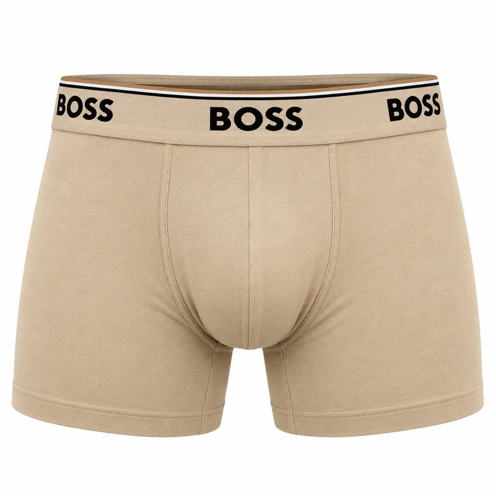 Beige BOSS men's boxer briefs with a black BOSS logo printed on the elastic waistband, shown against a plain white background.