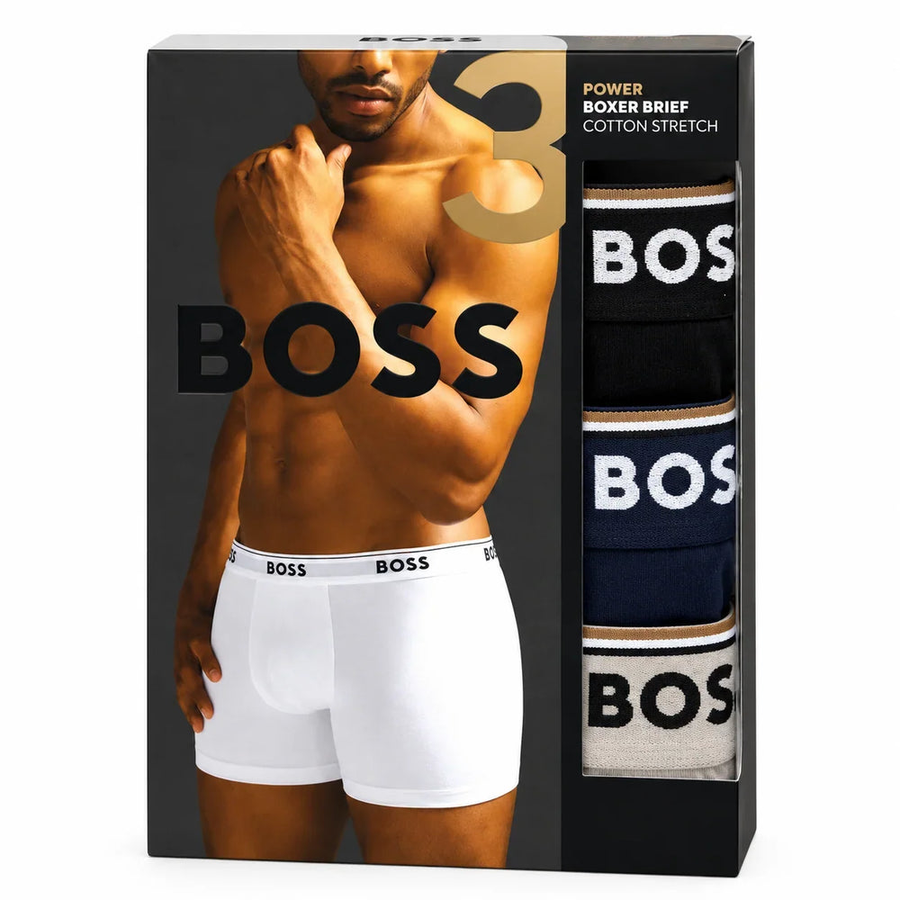 BOSS Power Cotton Stretch boxer briefs three-pack in black retail packaging, with black, navy and beige waistbands visible through the display window.