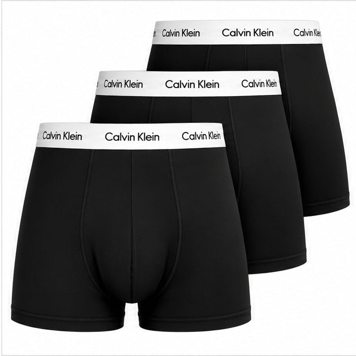 Three pairs of black Calvin Klein boxer briefs arranged in a staggered stack, showing the white waistband with the black Calvin Klein logo.